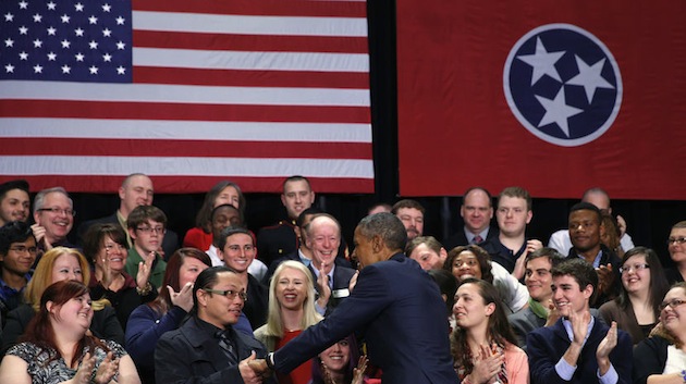 Obama shakes hands as he arrives to speak about during a visit to Pellissippi State College in Knoxville