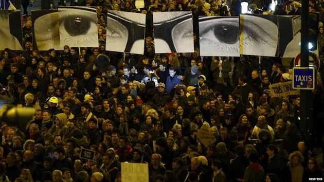 paris-rally-stephane-charbonnier-sign-reuters