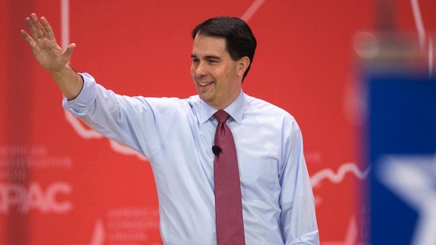 Governor Walker waves as he arrives to speak at the 42nd annual Conservative Political Action Conference