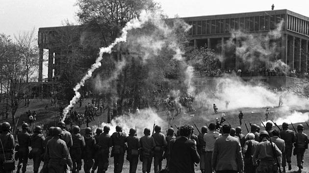 The National Guard fire tear gas to disperse the crowd of studen