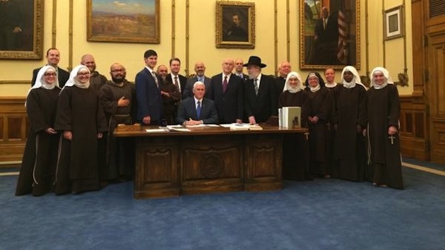 mike-pence-signing-religious-freedom-restoration-act