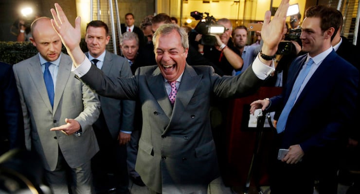 Nigel Farage, the leader of the UK Independence Party celebrates and poses for photographers as he leaves a "Leave.EU" organization party for the British European Union membership referendum in London, Friday, June 24, 2016. (Photo: AP/Matt Dunham)