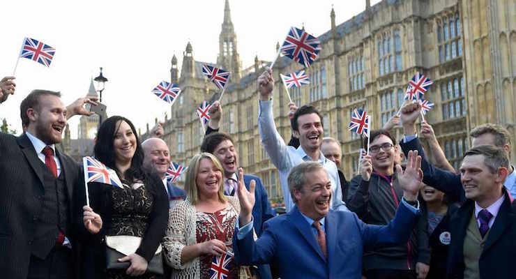 A very happy Nigel Farage (front), the leader of the United Kingdom Independence Party (UKIP) celebrates with supporters after the Brexit victory being the result of the EU referendum, outside the Houses of Parliament in London, Britain June 24, 2016. (Photo: REUTERS/Toby Melville)