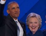 Democratic President Barack Obama, left, embraces Hillary Clinton, right, after speaking to the Democratic National Convention at the Wells Fargo Arena in Philadelphia. (Photo: AP)