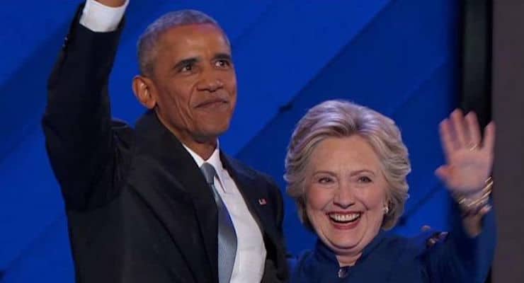 Democratic President Barack Obama, left, embraces Hillary Clinton, right, after speaking to the Democratic National Convention at the Wells Fargo Arena in Philadelphia. (Photo: AP)