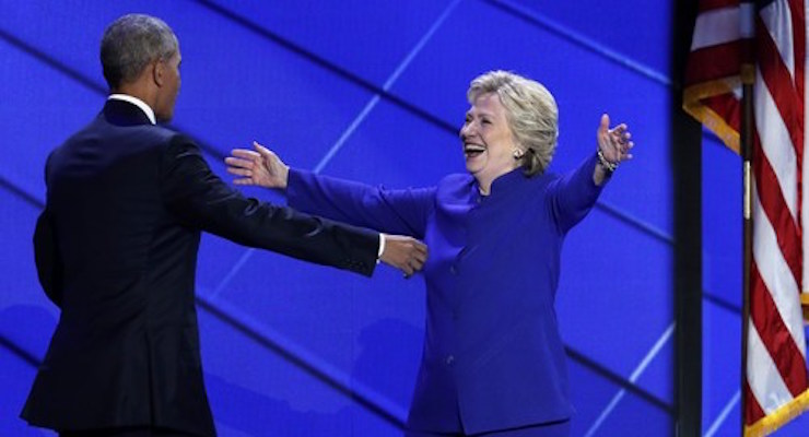 Democratic President Barack Obama, left, embraces Hillary Clinton, right, after speaking to the Democratic National Convention at the Wells Fargo Arena in Philadelphia. (Photo: FOX)