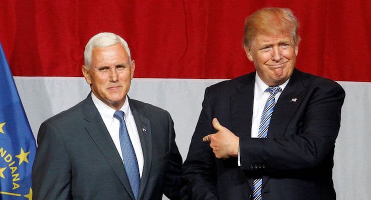 Republican presidential candidate Donald Trump, right, points to Indiana Gov. Mike Pence, left, during a rally in the Hoosier State. (Photo: Reuters)