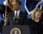 President Obama, left, and Hillary Clinton, right, at the ceremony for the victims of Benghazi on Sept. 14, 2012.