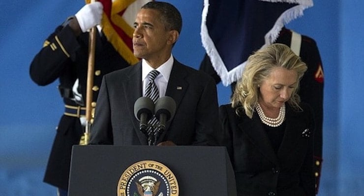 President Obama, left, and Hillary Clinton, right, at the ceremony for the victims of Benghazi on Sept. 14, 2012.