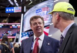 Trump Campaign Chairman Paul Manafort talks to delegates as he walks around the convention floor at the Quicken Loans Arena in Cleveland, Ohio. (Photo: AP)