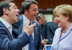 In this June 25, 2015 file photo Greek Prime Minister Alexis Tsipras, left, and Italian Prime Minister Matteo Renzi speak with German Chancellor Angela Merkel during a round table meeting at an EU summit in Brussels. Merkel has been named Times' Person of the Year, praised by the magazine for her leadership on everything from Syrian refugees to the Greek debt crisis. (Photo: AP, File)
