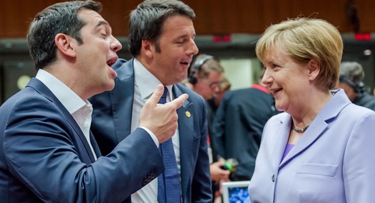 In this June 25, 2015 file photo Greek Prime Minister Alexis Tsipras, left, and Italian Prime Minister Matteo Renzi speak with German Chancellor Angela Merkel during a round table meeting at an EU summit in Brussels. Merkel has been named Times' Person of the Year, praised by the magazine for her leadership on everything from Syrian refugees to the Greek debt crisis. (Photo: AP, File)