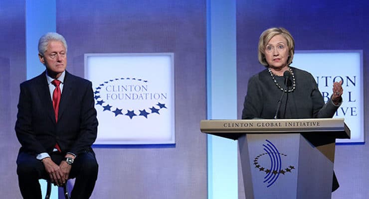Hillary Clinton and Bill Clinton speak at an event for the Clinton Foundation, or Clinton Global Initiative. (PHOTO: Greg Allen/Invision/AP)