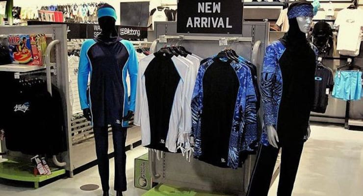 The Islamic full-length swimming suit known as burkini is displayed on mannequins at a department store in France.