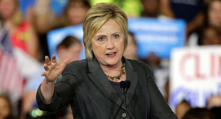 Hillary Clinton talks to supporters at a rally in August 2016. (Photo: AP/Associated Press)