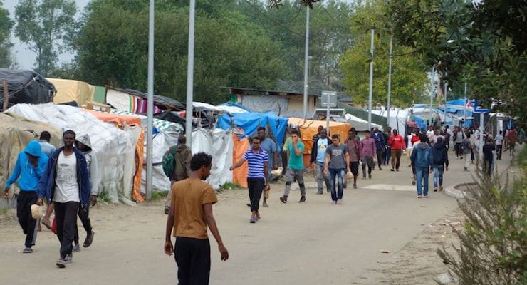 Muslim migrant refugees walk in the northern area of the camp called the "Jungle" in Calais, France on Sept. 6, 2016. (PHOTO: REUTERS)