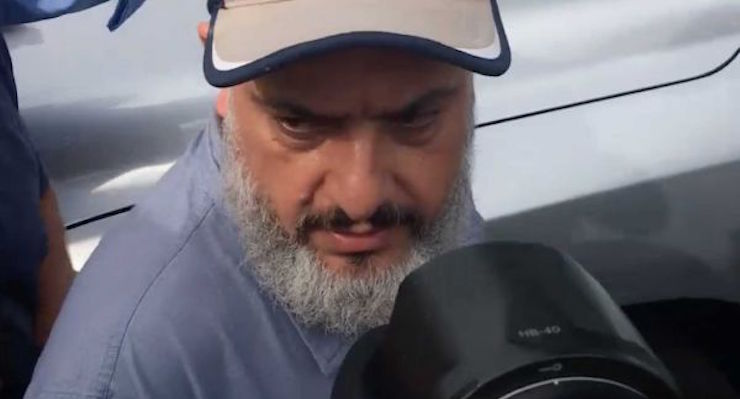 Mohammed Rahami, the father of bombing suspect Ahmad Khan Rahami, was walking to his car and spoke to the media in Elizabeth, New Jersey, on Sept. 20, 2016. Mohammed says his son is not a terrorist and points the finger at the FBI, saying the Feds know Ahmad's not a terrorist. (Credit: Newsday / Vic Barone)