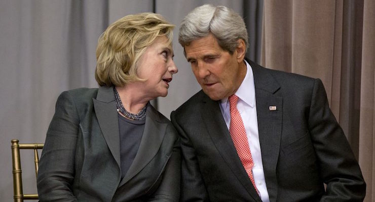 Secretary of State John Kerry speaks with former Secretary of State Hillary Rodham Clinton during the groundbreaking ceremony for the U.S. Diplomacy Center, Wednesday, Sept. 3, 2014, at the State Department in Washington. Kerry hosted five of his predecessors in a rare public reunion for the groundbreaking of a museum commemorating the achievements of American statesmanship. (Photo: AP/Carolyn Kaster)