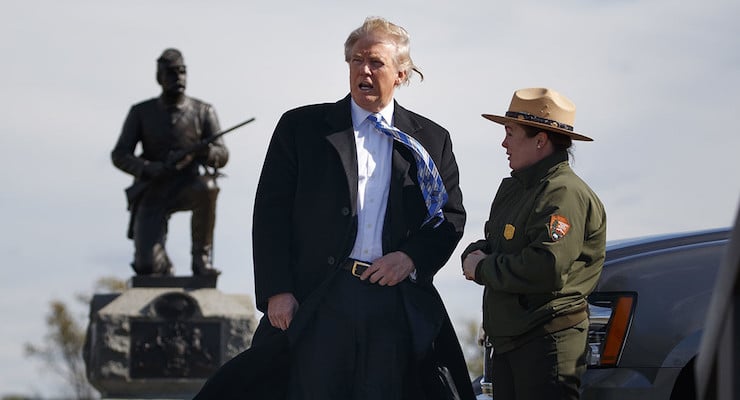 Interpretive park ranger Caitlin Kostic, right, gives a tour near the high-water mark of the Confederacy at Gettysburg National Military Park to Republican presidential candidate Donald Trump, Saturday, Oct. 22, 2016, in Gettysburg, Pa. (AP Photo/ Evan Vucci)