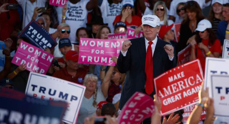 Republican presidential candidate Donald Trump pumps his fist during a campaign rally, Sunday, Oct. 23, 2016, in Naples, Fla. (AP Photo/ Evan Vucci)