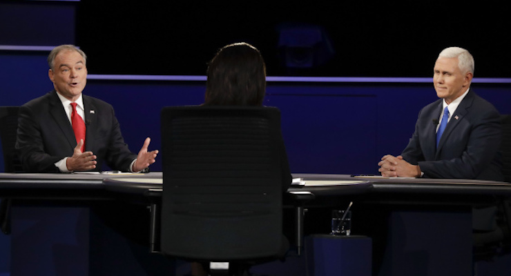 Democratic vice-presidential nominee Sen. Tim Kaine answers a question as Republican vice-presidential nominee Gov. Mike Pence listens during the vice-presidential debate at Longwood University in Farmville, Va., Tuesday, Oct. 4, 2016. (Photo: AP/David Goldman)