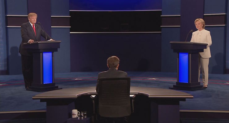 Moderator Chris Wallace, of FOX News, turns towards the audience as he questions Democratic presidential nominee Hillary Clinton and Republican presidential nominee Donald Trump during the third presidential debate at UNLV in Las Vegas, Wednesday, Oct. 19, 2016.(AP Photo/Julio Cortez)