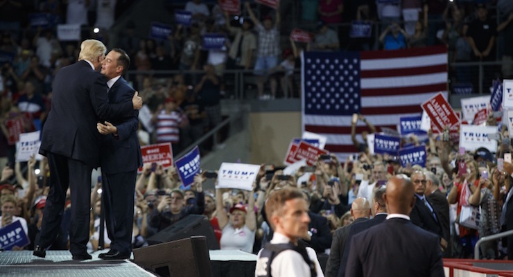 Republican National Committee (RNC) Chairman Reince Priebus greets Republican presidential candidate Donald Trump during a campaign rally, Friday, Aug. 12, 2016, in Erie, Pa. (Photo: AP/Evan Vucci)