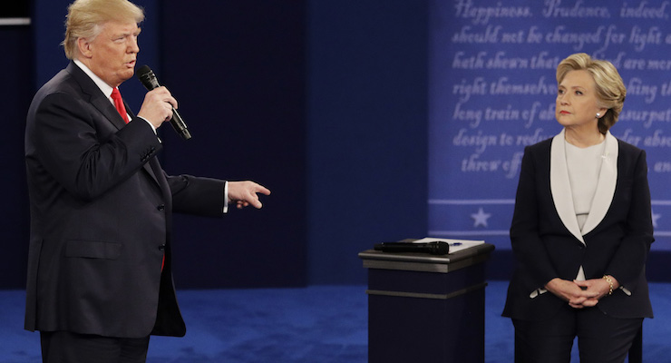 Republican presidential nominee Donald Trump answers Democratic presidential nominee Hillary Clinton during the second presidential debate at Washington University in St. Louis, Sunday, Oct. 9, 2016. (Photo: AP/John Locher)