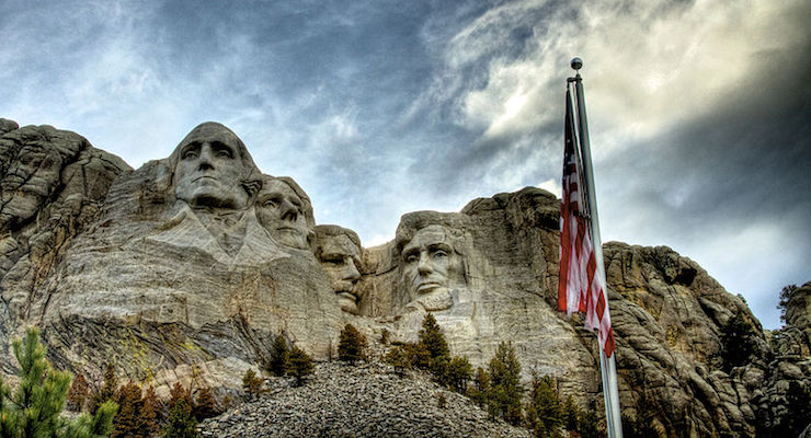 Mount Rushmore National Memorial is a sculpture carved into the granite face of Mount Rushmore, a granite batholith formation in the Black Hills in Keystone, South Dakota, United States. Sculpted by Gutzon Borglum and his son, Lincoln Borglum, Mount Rushmore features 60-foot (18 m) sculptures of the heads of four United States presidents: George Washington (1732–1799), Thomas Jefferson (1743–1826), Theodore Roosevelt (1858–1919), and Abraham Lincoln (1809–1865).