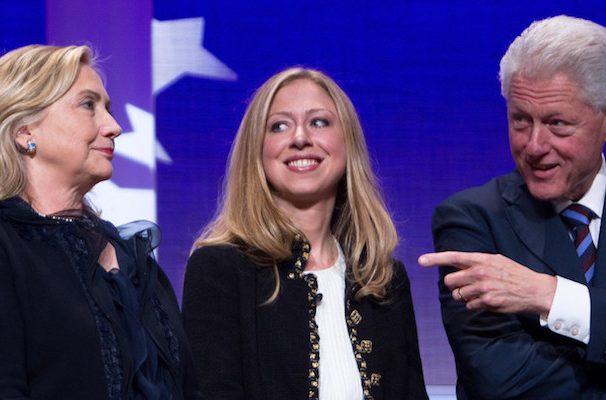 Former President Bill Clinton, right, stands on stage with then-Secretary of State Hillary Rodham Clinton, left, and their daughter Chelsea Clinton during the closing Plenary session of the seventh Annual Meeting of the Clinton Foundation, or the Clinton Global Initiative, on September 22 in New York City. (Photo: Reuters)