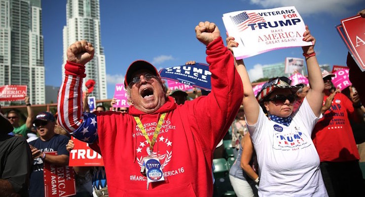 Fermin Vazquez cheers before the arrival of Republican presidential candidate Donald Trump during his campaign rally at the Bayfront Park Amphitheater on November 2, 2016 in Miami, Florida. Trump continues to campaign against his Democratic challenger Hillary Clinton as election day nears. (Photo: Getty Images)