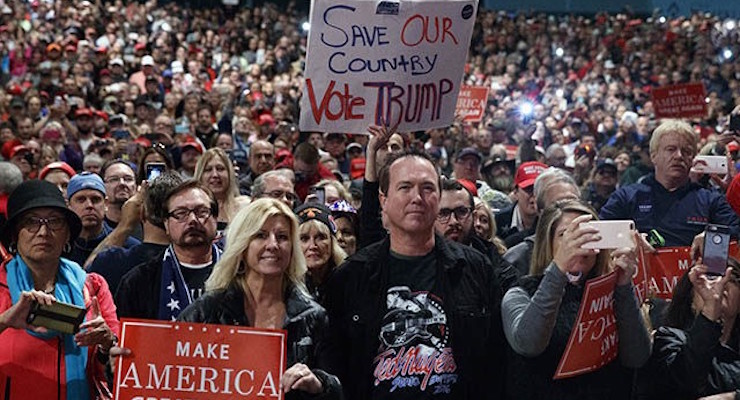 Supporters of Republican presidential candidate Donald Trump speaks during a campaign rally, Sunday, Nov. 6, 2016, in Sterling Heights, Mich. (Photo: AP)