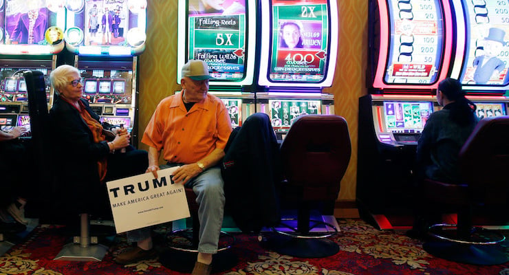 Frank Osysko waits at a slot machine before a rally for Republican presidential candidate Donald Trump on Thursday, Jan. 21, 2016, in Las Vegas. (AP Photo/Isaac Brekken)