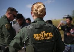 U.S. Border Patrol agents prepare to launch a raid by the Rio Grande that separates the U.S. from Mexico in McAllen, Texas, on Tuesday, November 25, 2014. The troopers patrol the river all day to catch illegal immigrants attempting to cross the border.