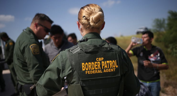 U.S. Border Patrol agents prepare to launch a raid by the Rio Grande that separates the U.S. from Mexico in McAllen, Texas, on Tuesday, November 25, 2014. The troopers patrol the river all day to catch illegal immigrants attempting to cross the border.