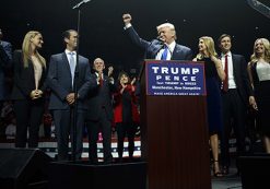 Republican presidential candidate Donald Trump pumps his fist as he arrives to speak during a campaign rally, Monday, Nov. 7, 2016, in Manchester, N.H. From back left are Eric Trump, Vanessa Trump, Donald Trump Jr., Republican vice presidential candidate Gov. Mike Pence, R-Ind., Karen Pence, Ivanka Trump, Jared Kushner, and Tiffany Trump. (Photo: AP)