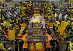 FILE PHOTO - Robotic arms spot welds on the chassis of a Ford Transit Van under assembly at the Ford Claycomo Assembly Plant in Claycomo, Missouri April 30, 2014. (Photo: REUTERS)