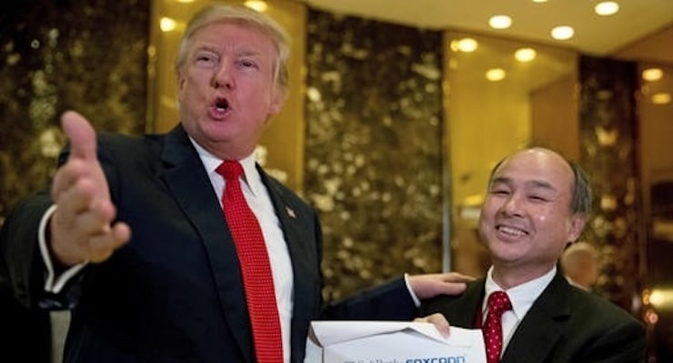 President-elect Donald Trump, accompanied by SoftBank CEO Masayoshi Son, speaks to members of the media at Trump Tower in New York, Tuesday, Dec. 6, 2016. (Photo: AP)