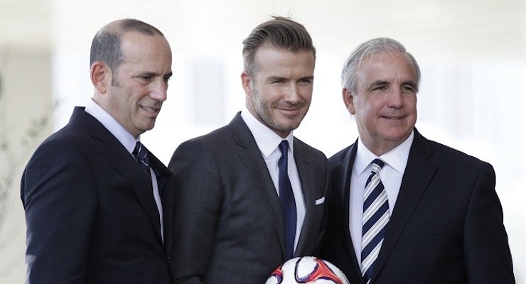 MLS commissioner Don Garber, left, David Beckham, center, and Miami-Dade County Mayor Carlos Gimenez, right. (Photo: Reuters)