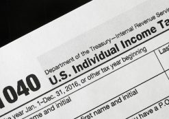 A 1040 tax form appears on display, Tuesday, Jan. 10, 2017, in New York. (Photo: AP)