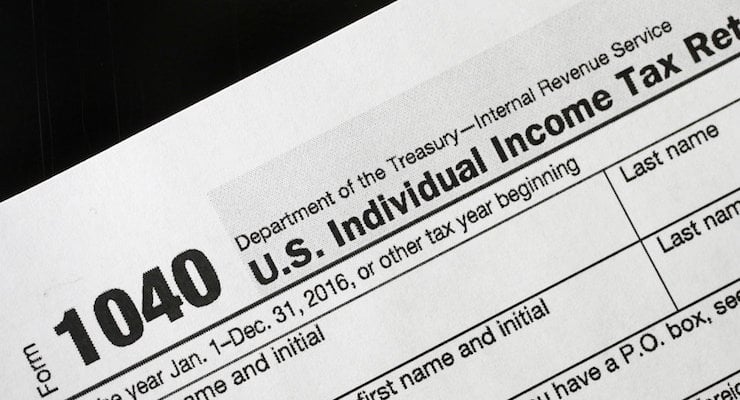 A 1040 tax form appears on display, Tuesday, Jan. 10, 2017, in New York. (Photo: AP)