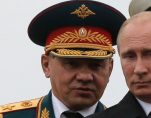Russian Defense Minister Sergei Shoigu, left, and Russian President Vladimir Putin, right.