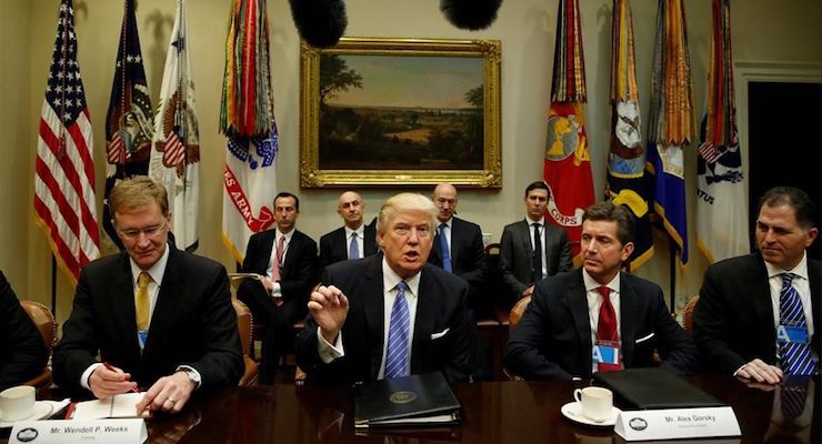US President Donald Trump hosts a meeting with business leaders in the Roosevelt Room of the White House in Washington on Monday January 23, 2017. (Photo: Reuters)