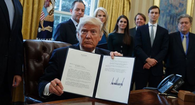 President Donald Trump shows his signature on an executive order on the Keystone XL pipeline, Tuesday, Jan. 24, 2017. (Photo: AP)