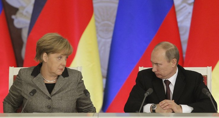 Russian President Vladimir Putin, right, with German Chancellor Angela Merkel during a joint news conference in Moscow's Kremlin on Nov.16, 2012. (Photo: Reuters)