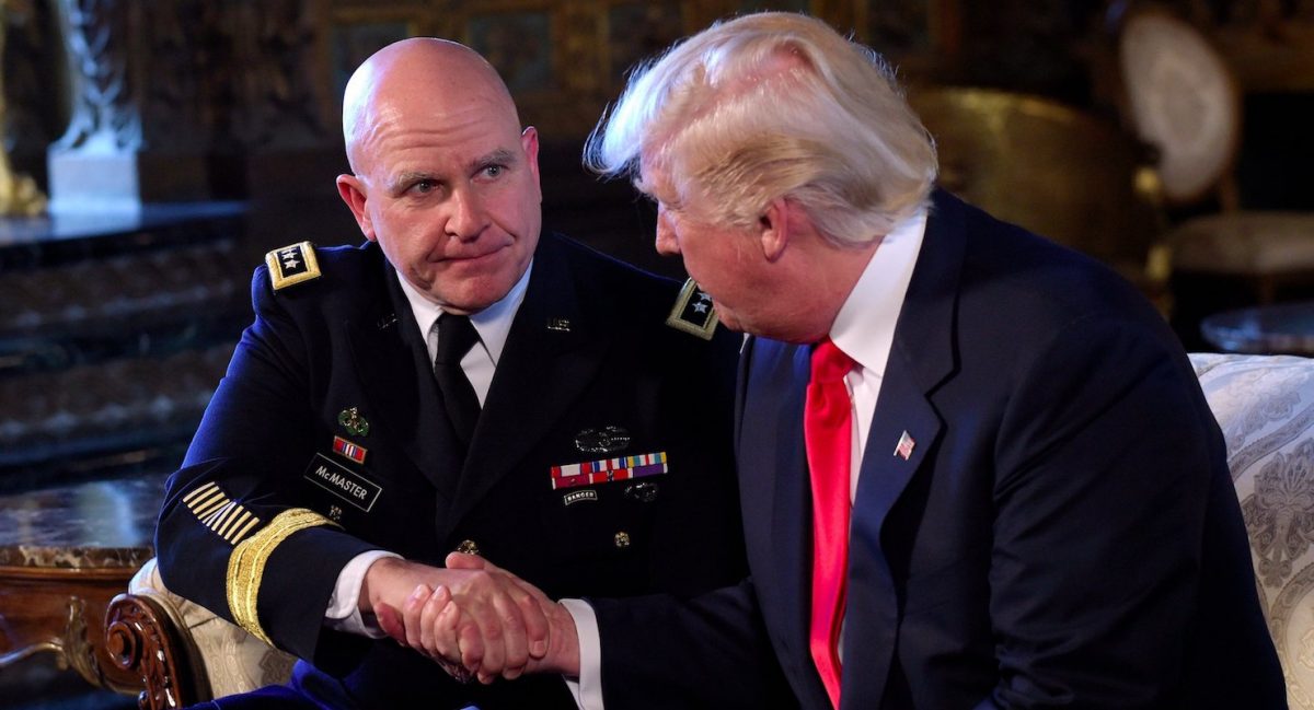 President Donald Trump, right, shakes hands with Army Lt. Gen. H.R. McMaster, left, at Trump's Mar-a-Lago estate.