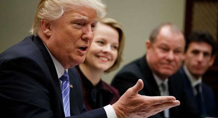 President Donald Trump speaks during a meeting with retail industry leaders in the Roosevelt Room of the White House in Washington, Wednesday, Feb. 15, 2017. From left are, Trump, Jo-Ann Craft Stores CEO Jill Soltau, Gap Inc. CEO Art Peck, and Jeremy Katz, an adviser to National Economic Council Director Gary Cohn.