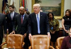 President Donald Trump arrives for a meeting with retail industry leaders in the Roosevelt Room of the White House in Washington, Wednesday, Feb. 15, 2017. From left are, Gary Cohn, director of the National Economic Council; J.C. Penney CEO Marvin Ellison and Jo-Ann Craft Stores CEO Jill Soltau.