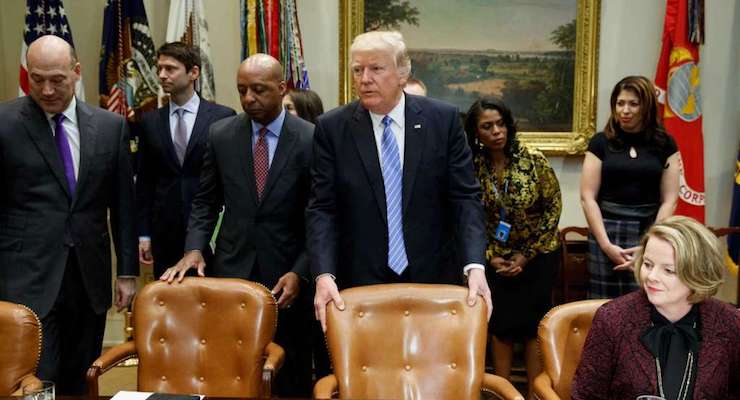 President Donald Trump arrives for a meeting with retail industry leaders in the Roosevelt Room of the White House in Washington, Wednesday, Feb. 15, 2017. From left are, Gary Cohn, director of the National Economic Council; J.C. Penney CEO Marvin Ellison and Jo-Ann Craft Stores CEO Jill Soltau.