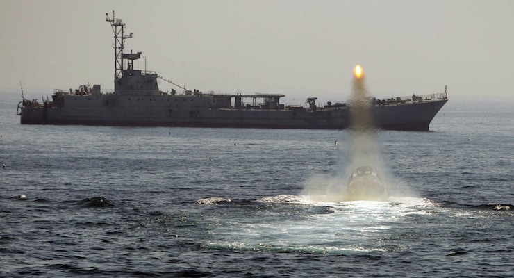 The Iranian Navy fires a missile in the Persian Gulf. (Photo: Reuters)